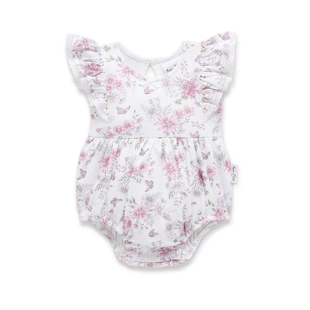Floral baby romper on a white background