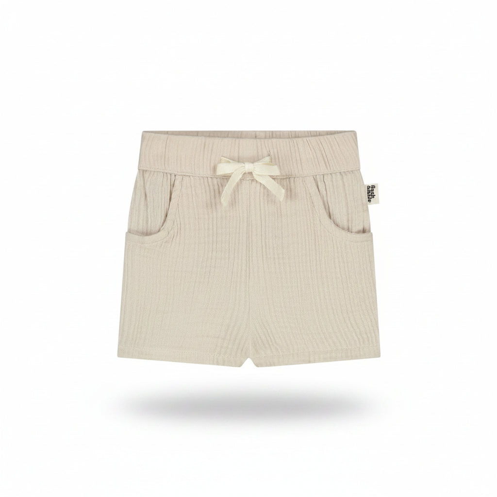 Beige shorts with a drawstring on a white background