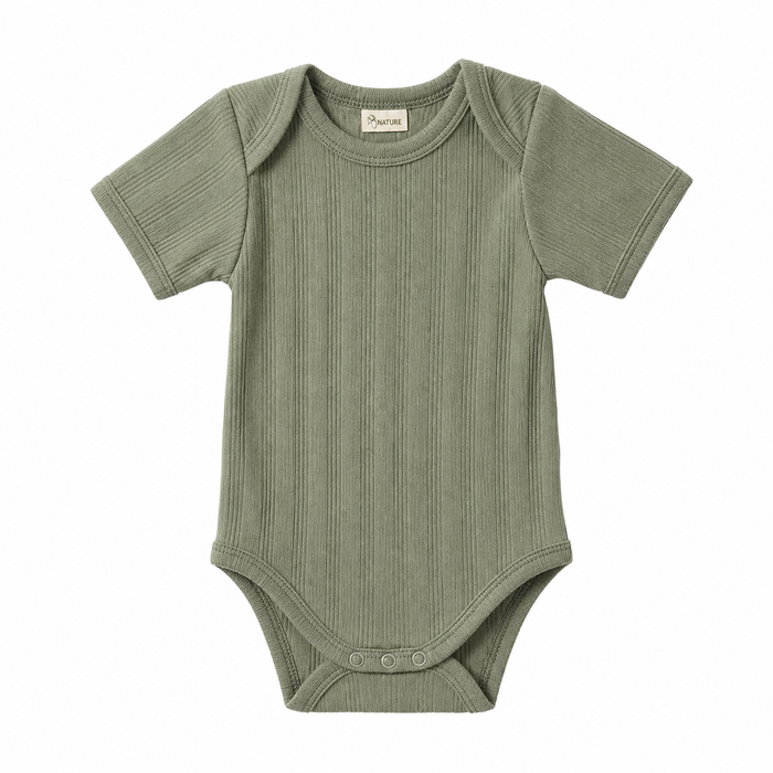 Green baby onesie on a white background