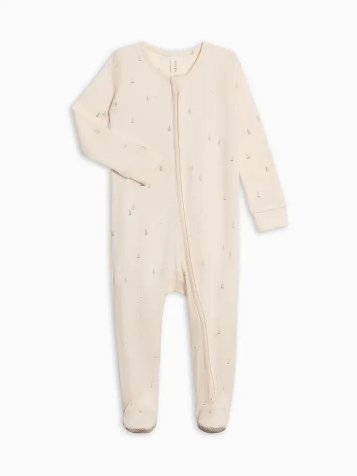Beige baby onesie with long sleeves and legs on a white background