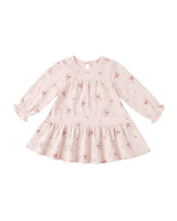 Pink dress with floral pattern on a white background