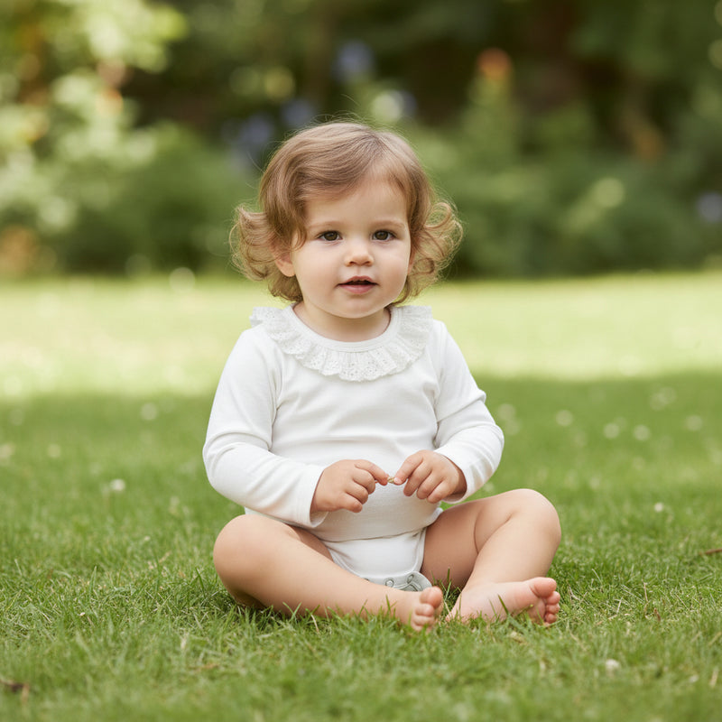 Coconut Ruffle Onesie