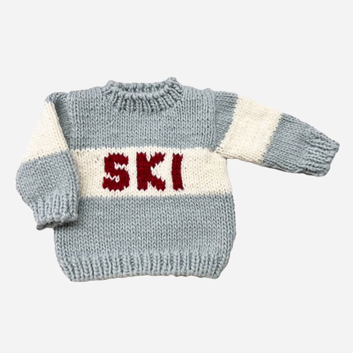 Knitted sweater with 'Ski' text on a white background