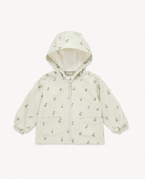 A hooded zip-front jacket for toddlers, featuring a light sage green fabric with a small brown and beige fruit print, elastic cuffs, and two front patch pockets.