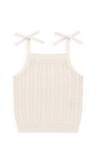 An off-white knit camisole top with a textured chevron pattern and thin shoulder straps tied in bows, shown on a plain white background.