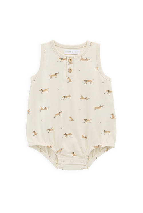 Baby romper with dog pattern on a white background