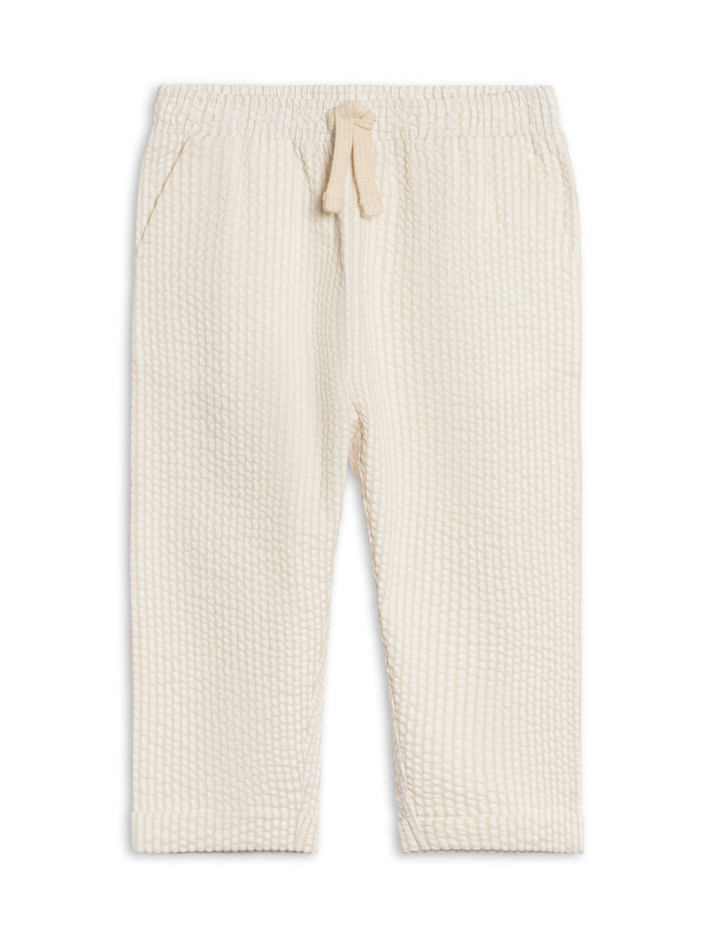 Cream-colored ribbed pants on a white background