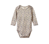 Floral-patterned baby bodysuit on a white background