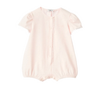 Light pink baby romper on a white background