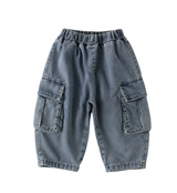 Light blue denim cargo shorts with an elastic waistband, laid flat on a light beige background.