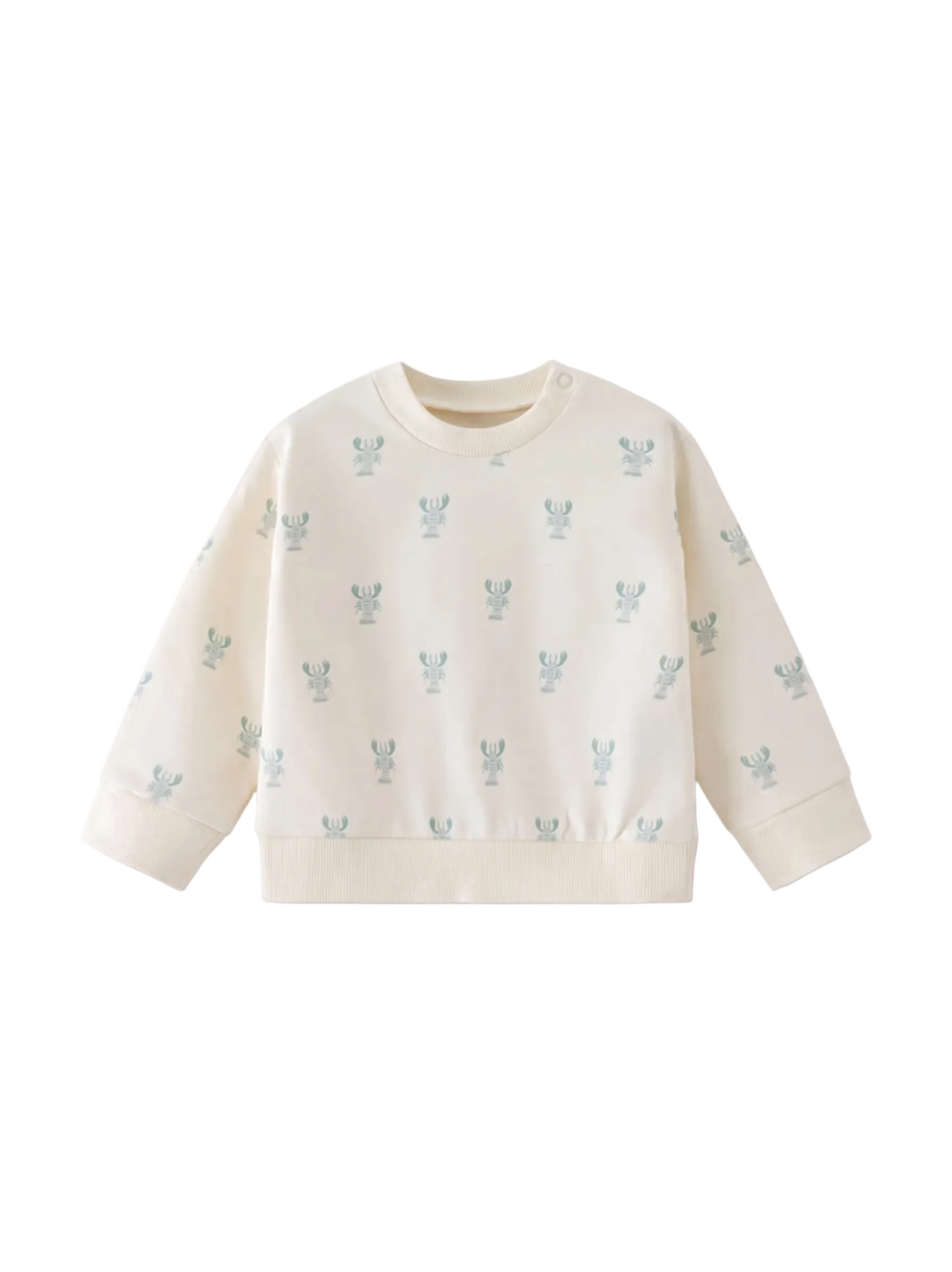 White sweater with small blue patterns on a white background