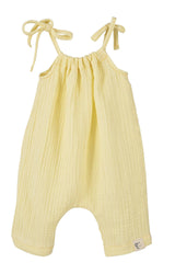 Yellow baby romper with thin straps on a white background