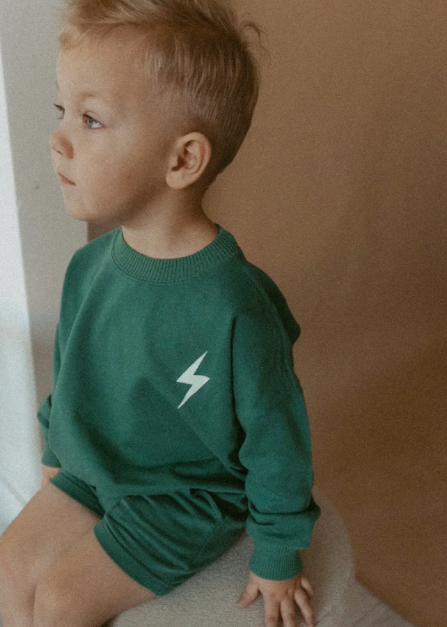 Green lightning bolt kids sweatshirt - front