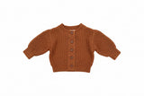 Brown knitted cardigan on a white background